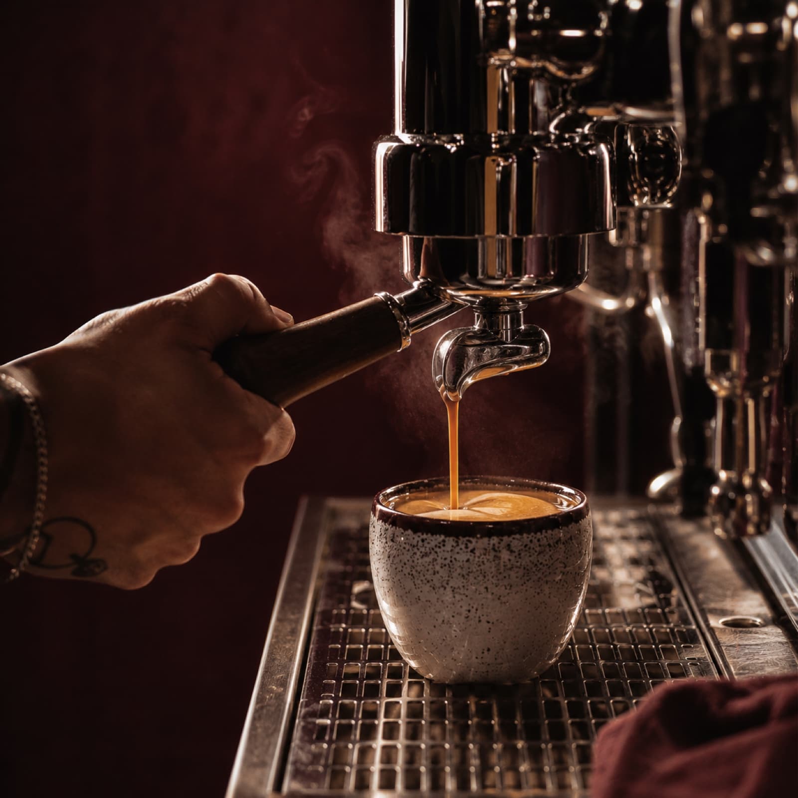Barista pulling an espresso on the machine